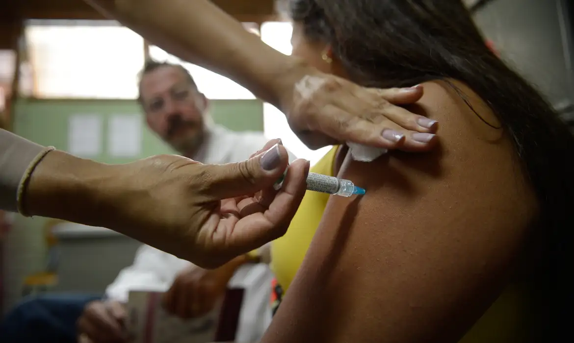 trabalhadores sobre cânceres e vacina