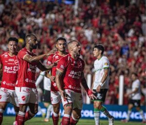 Jogadores do Vila comemoram o único gol da equipe contra o America-MG